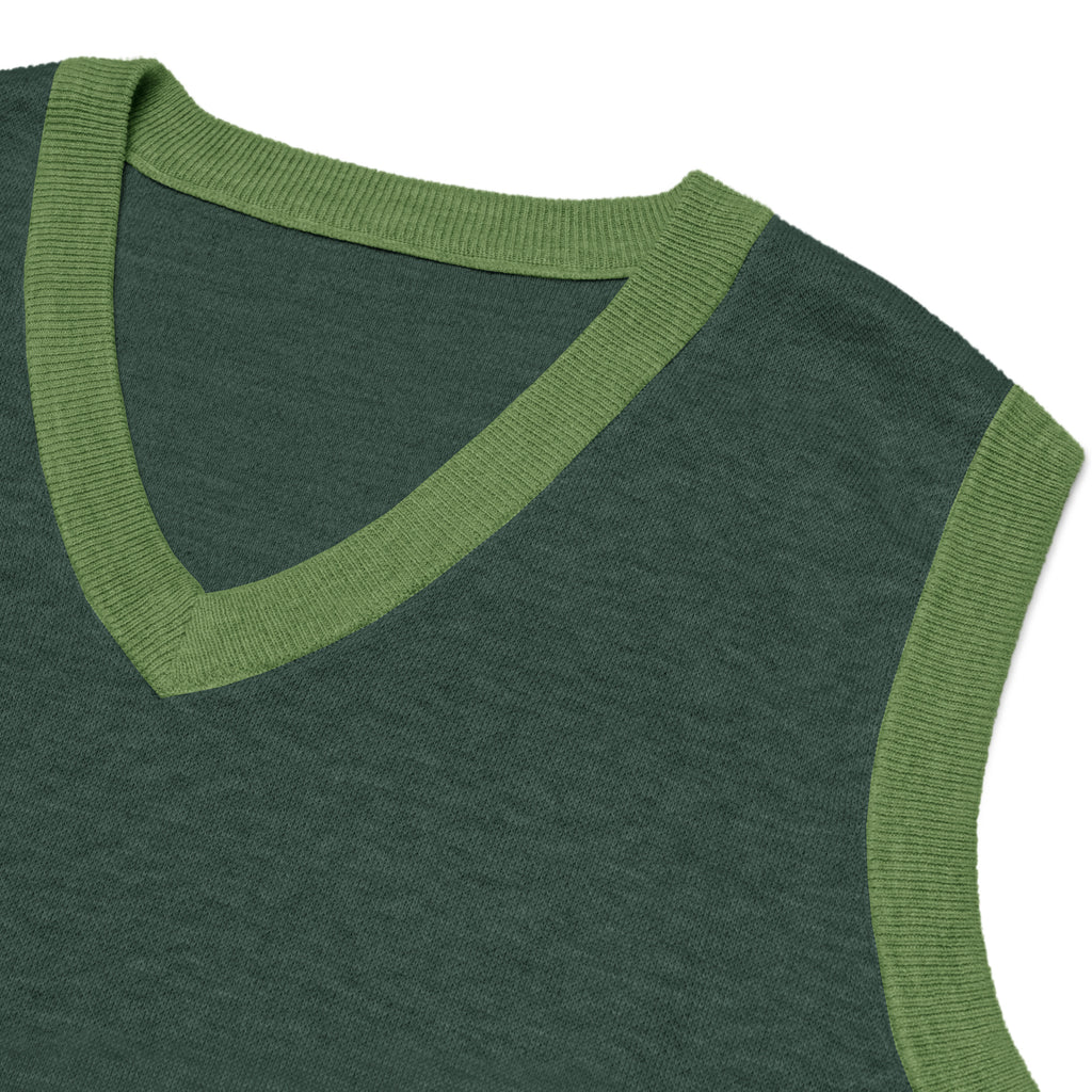Close-up detail of V-neck collar and contrast trim knitwear