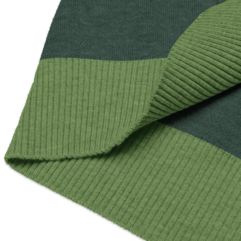 Fabric texture close-up of ribbed knit sweater vest