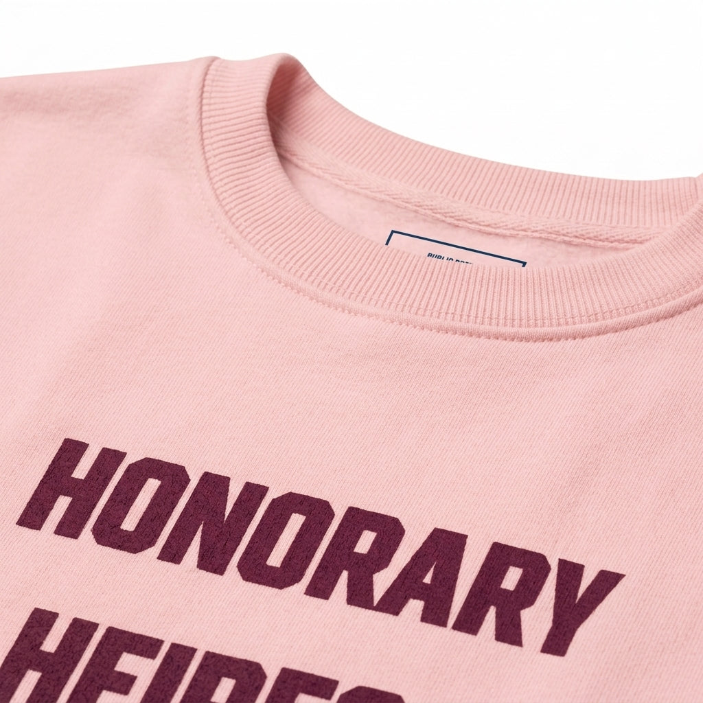 Detail close-up of soft cotton fabric and burgundy Honorary Heiress print